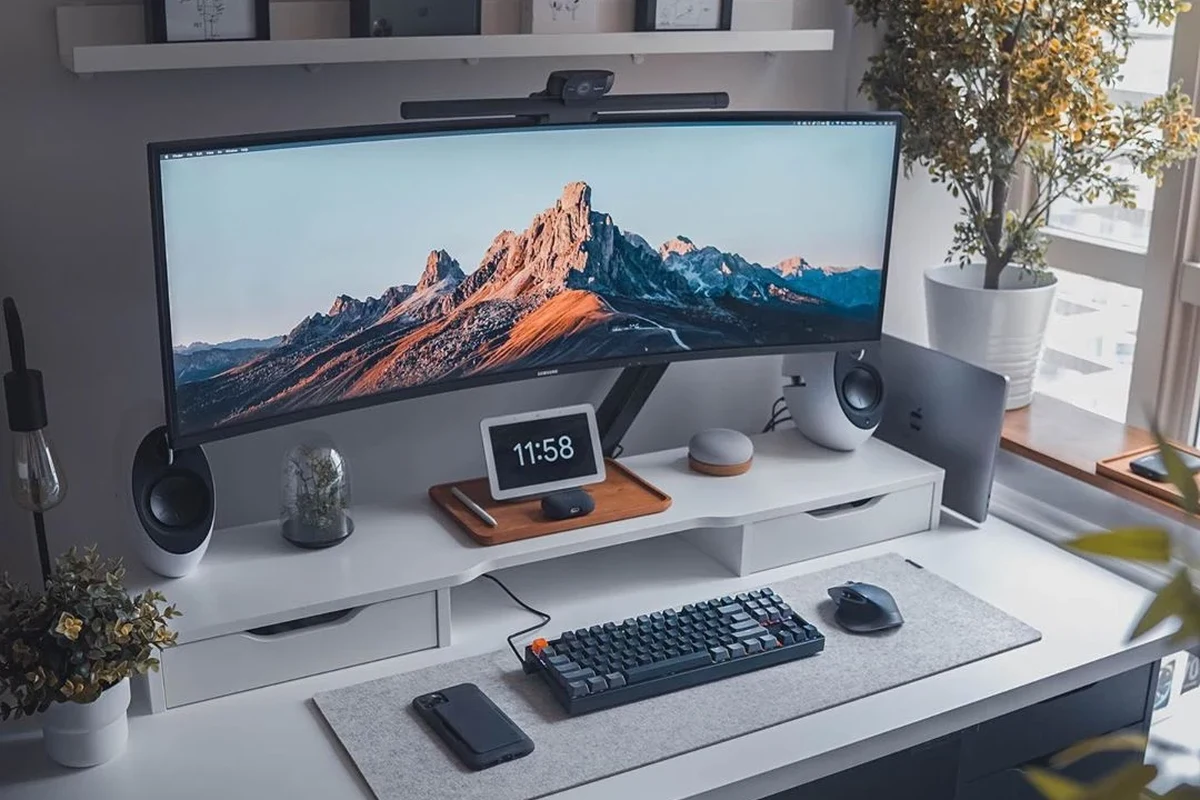 Honeywell desk fan on a small home office desk providing personal cooling