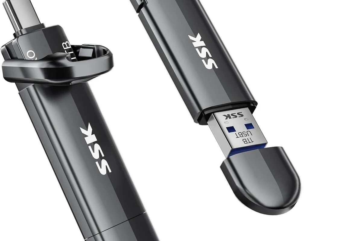 Eureka robot vacuum on charging dock with focus on metal charging contacts