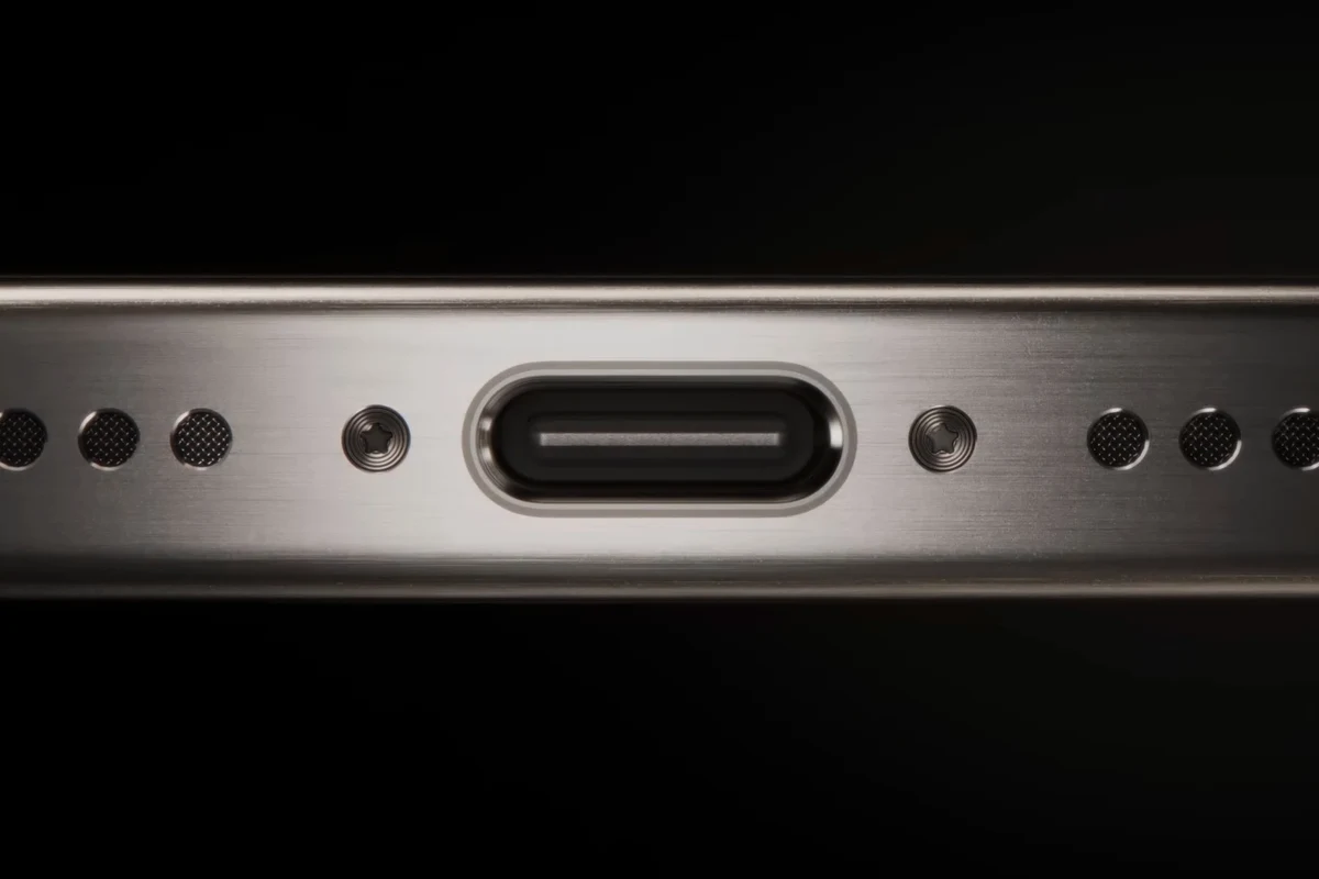 Arctic Air neck fan with USB charging cable connected to a portable power source