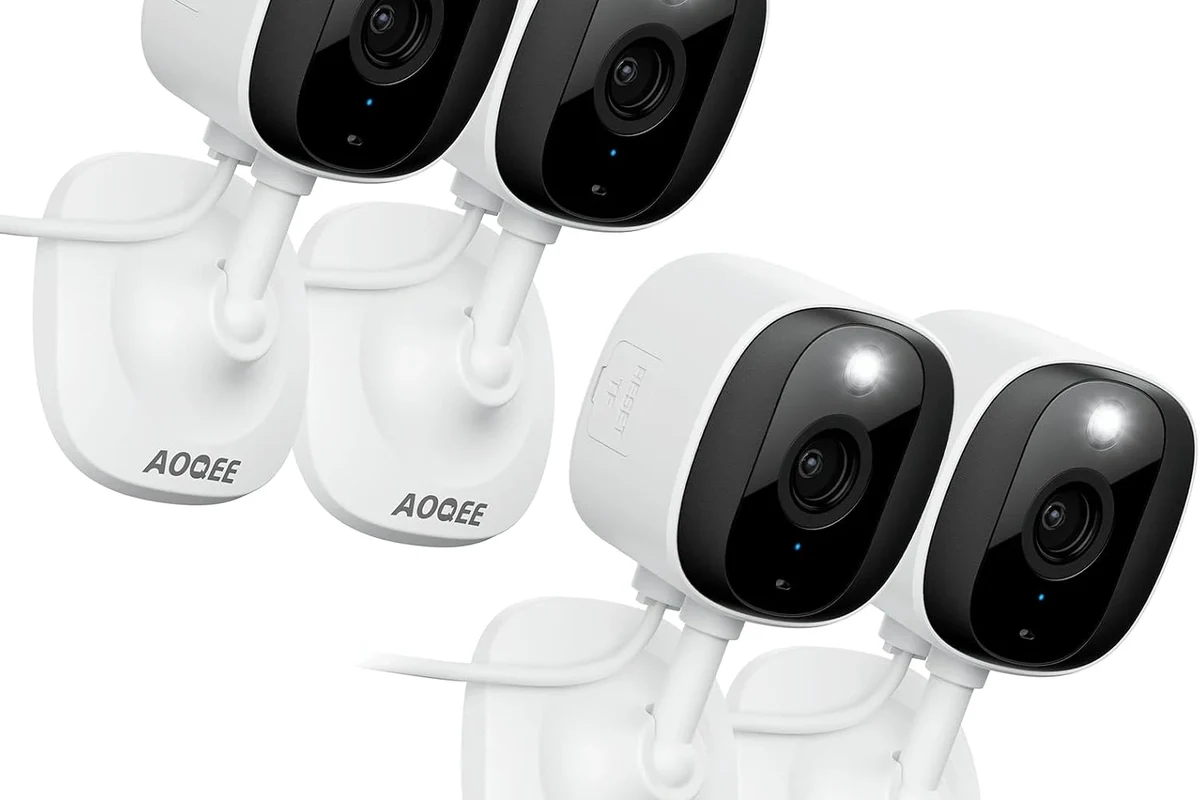 Aoqee-style smart home security camera mounted near a doorway in a modern house