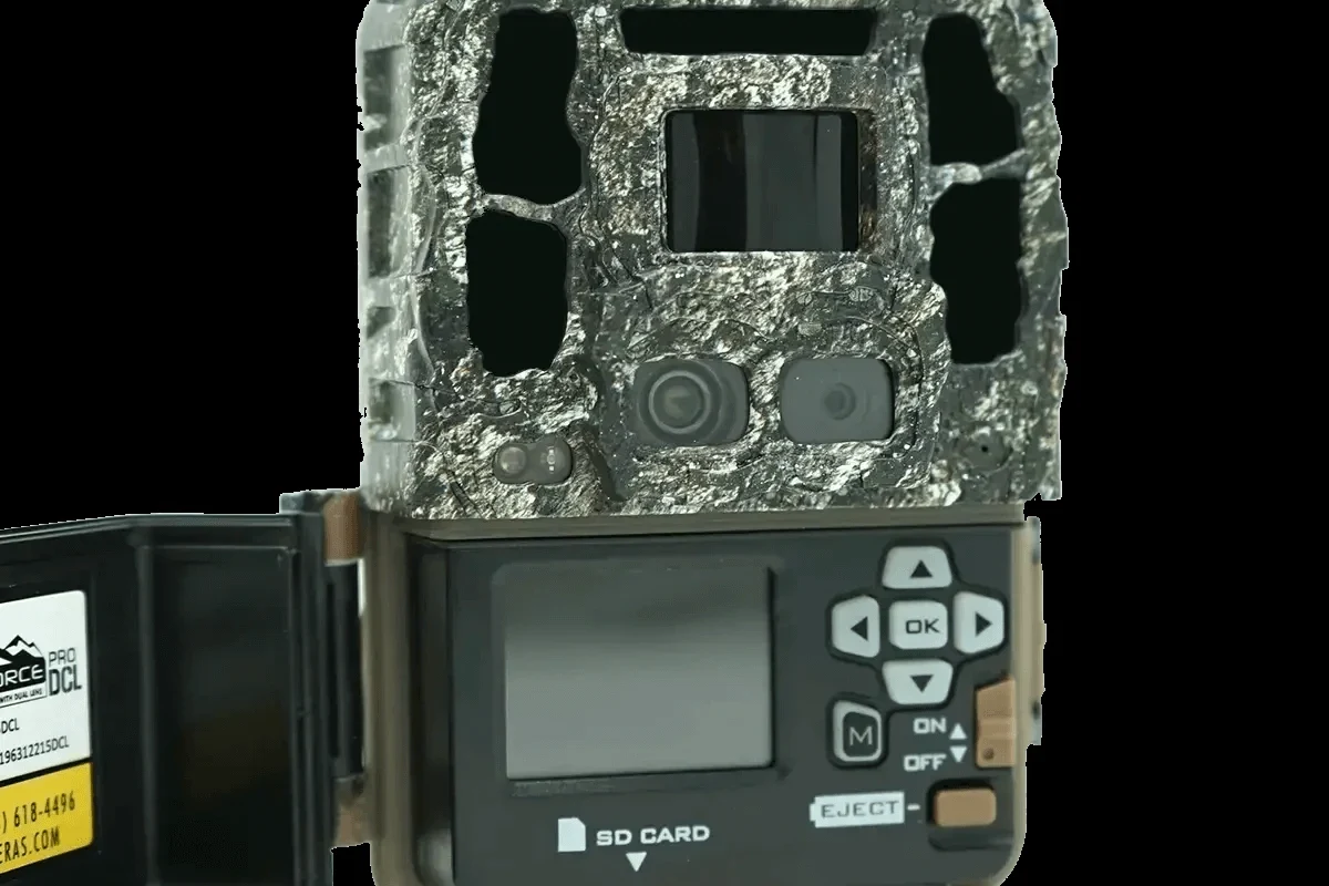 Compact Browning Dark Ops DCL Nano trail camera mounted on a tree for discreet outdoor monitoring