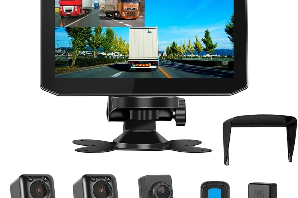 Semi-truck with mirror-mounted cameras and in-cab displays for blind-spot visibility