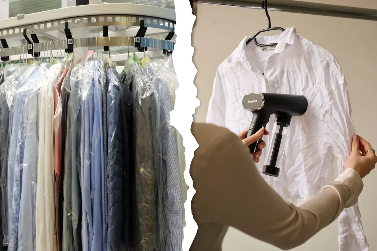 Dry cleaner steaming a formal dress on a hanger in a garment care shop