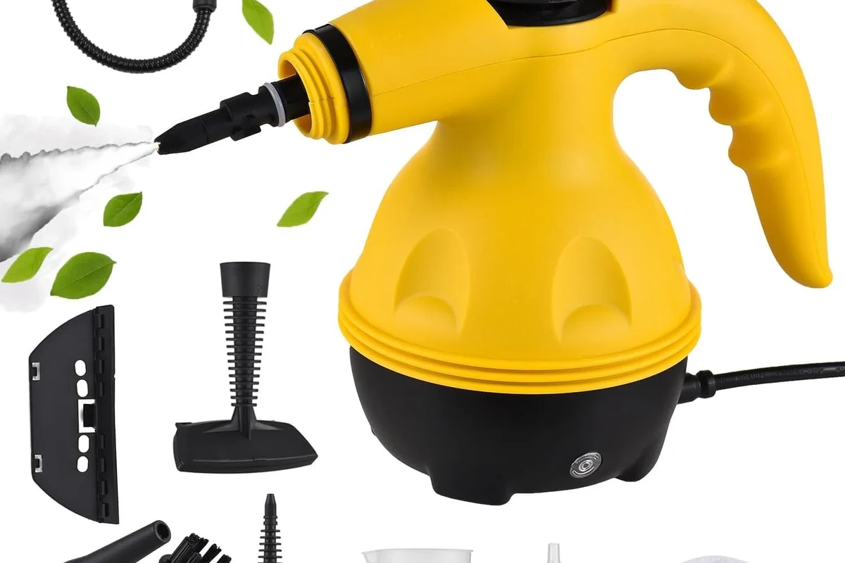 Steam cleaner removing visible mold from bathroom tile and grout