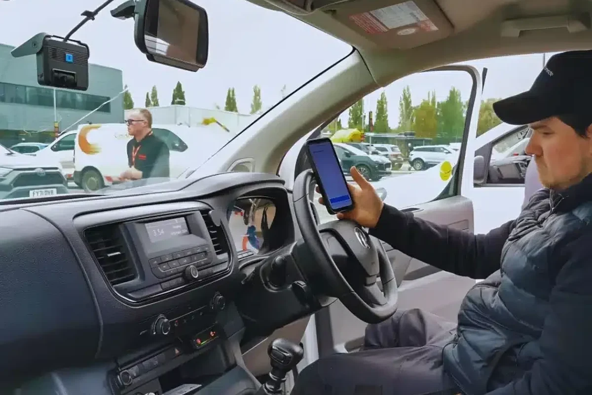 Driver-facing dash camera mounted inside an Illinois vehicle cabin