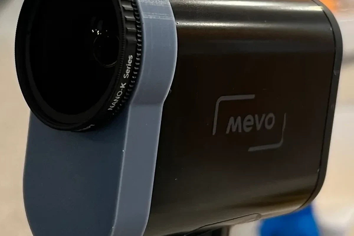 Smart camera connected to a Windows 11 PC with troubleshooting setup on the desk