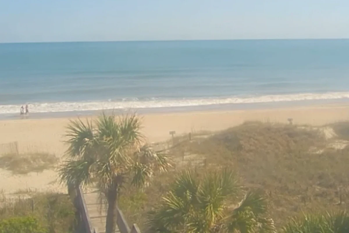 Live Ocean Isle beach webcam view showing shoreline, surf, and coastal conditions