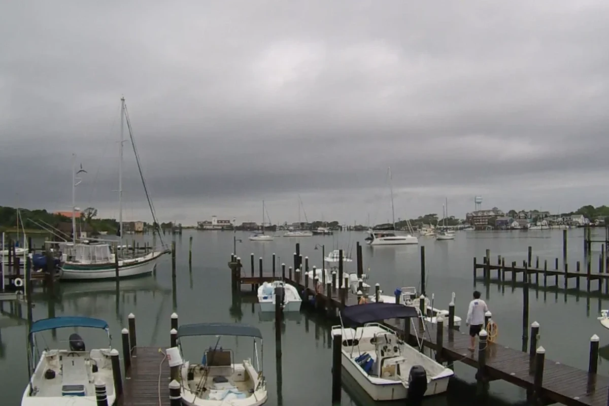 Outdoor smart camera overlooking a coastal beach with ocean view and weatherproof mounting