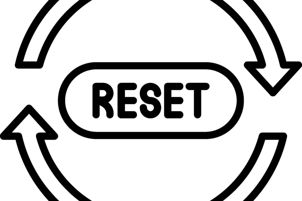 Person resetting a Govee smart plug while checking Wi-Fi setup on a phone