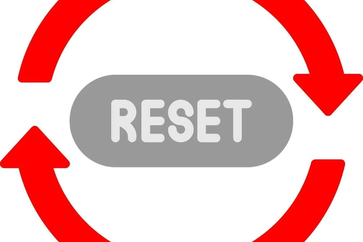Meross smart plug plugged into an outlet with a reset button and status light