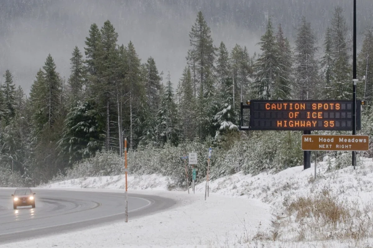 Live road camera view of Siskiyou Summit showing mountain pass traffic and winter conditions