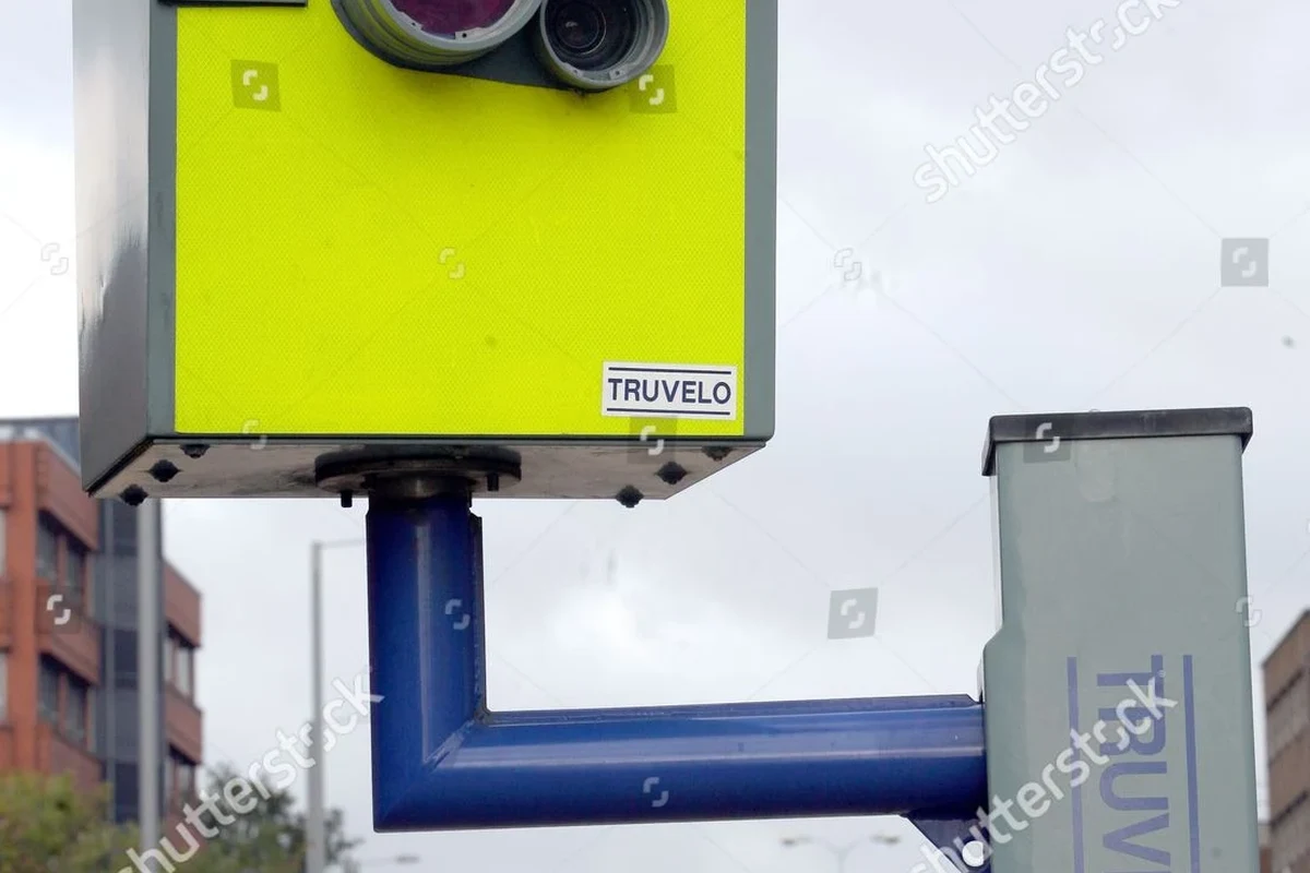Traffic enforcement camera mounted roadside for speed monitoring on a city street