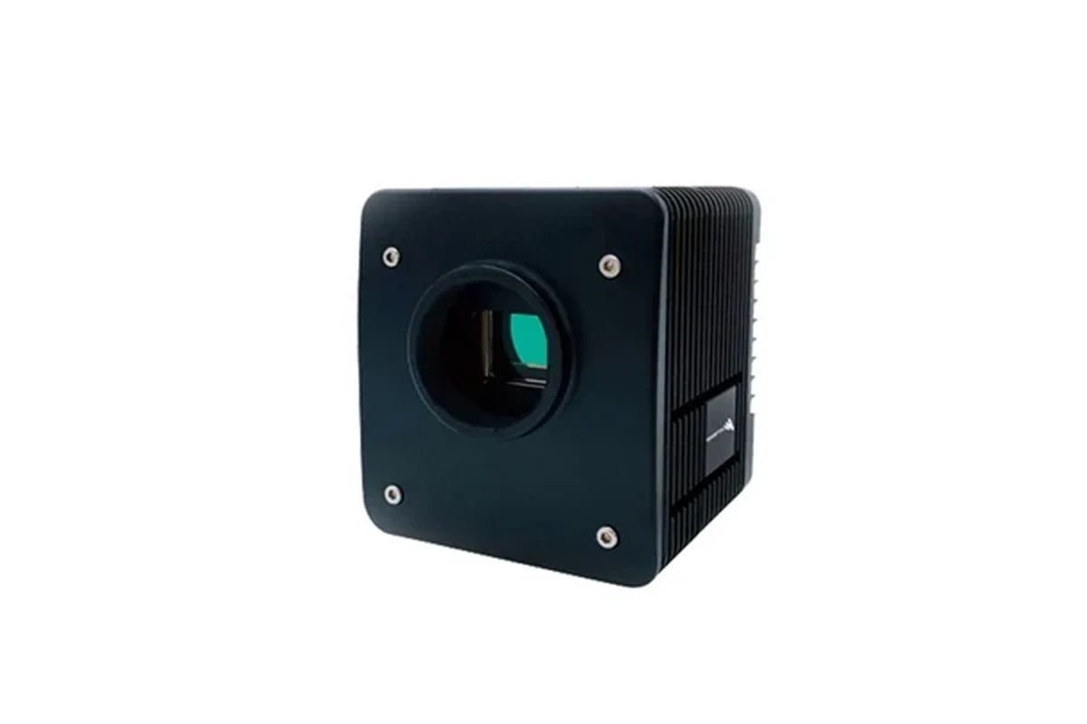 Smart home camera on a shelf beside a router in a modern living room