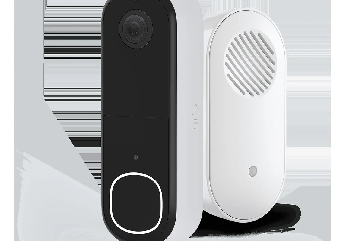 Arlo video doorbell and indoor chime setup on a home entryway table