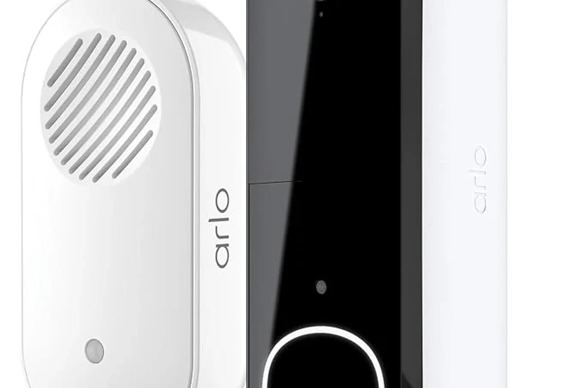 Arlo video doorbell and indoor chime setup on a home entryway table
