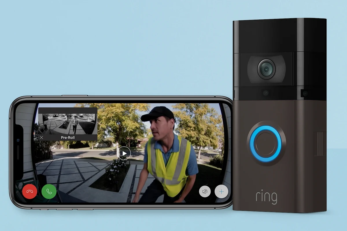 Modern video doorbell mounted near a front door with smartphone app monitoring