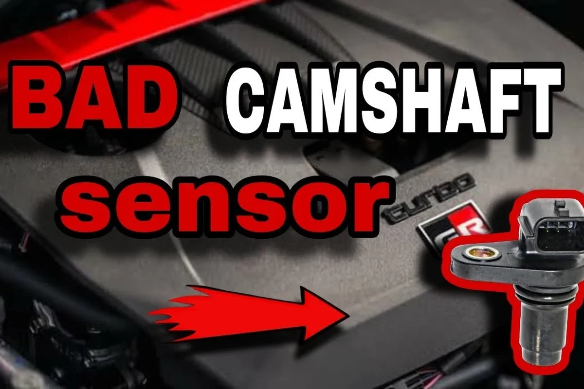 Mechanic-style diagnostic view of a camshaft position sensor and engine wiring near a car engine