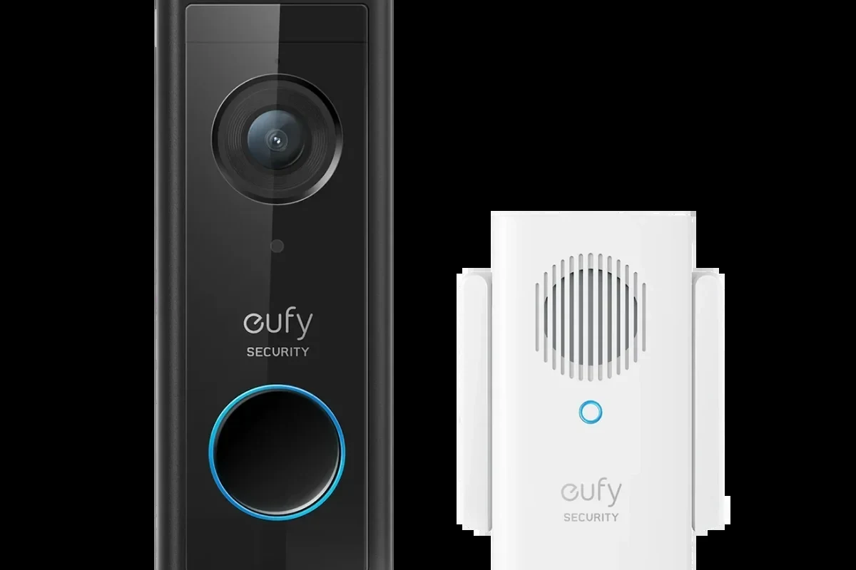 Modern Eufy-style video doorbell mounted beside a front door with package monitoring view