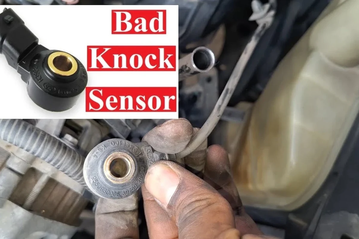 Mechanic inspecting an engine knock sensor connector during diagnostic troubleshooting