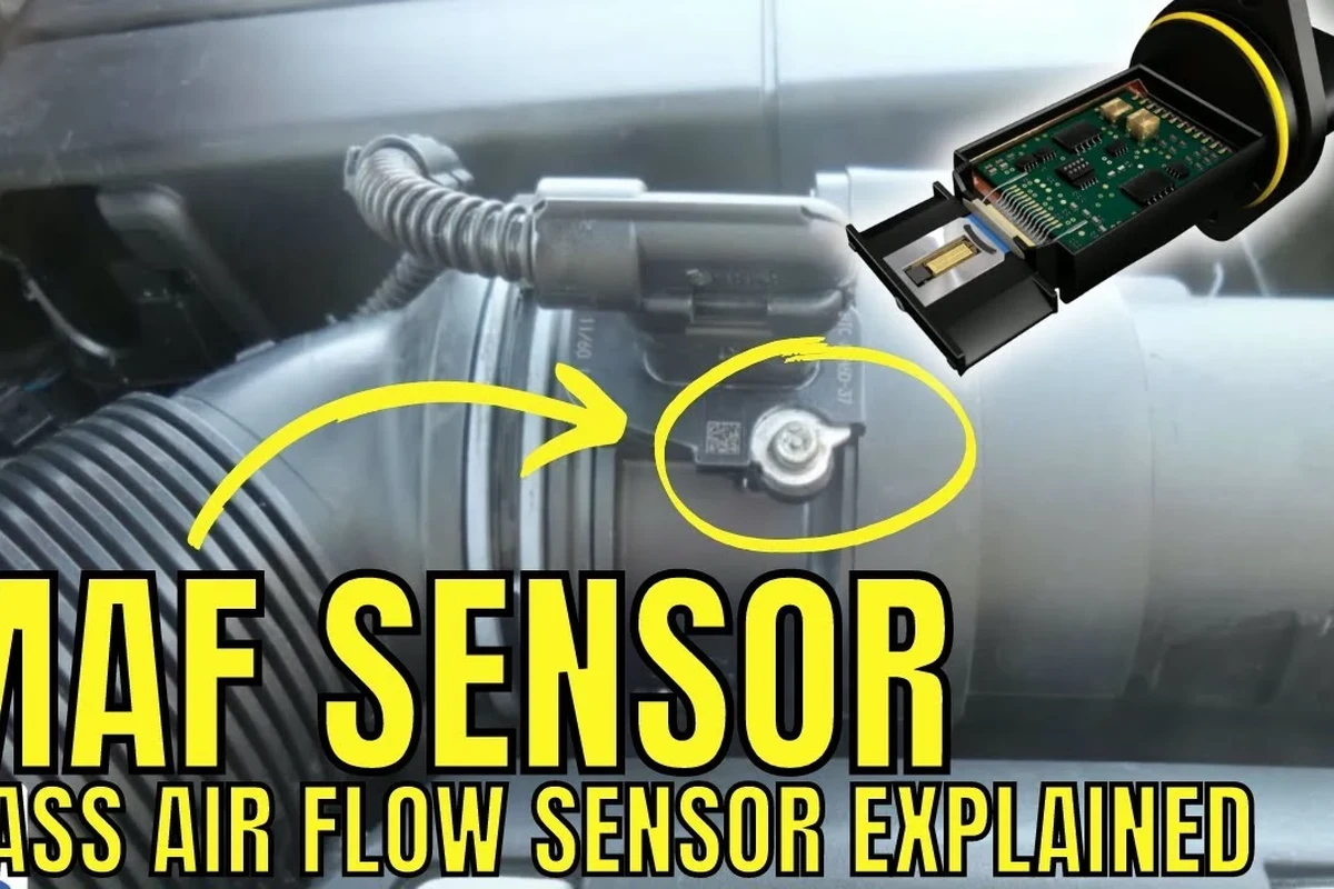 Close-up of a car mass air flow sensor in the intake system with moisture concern