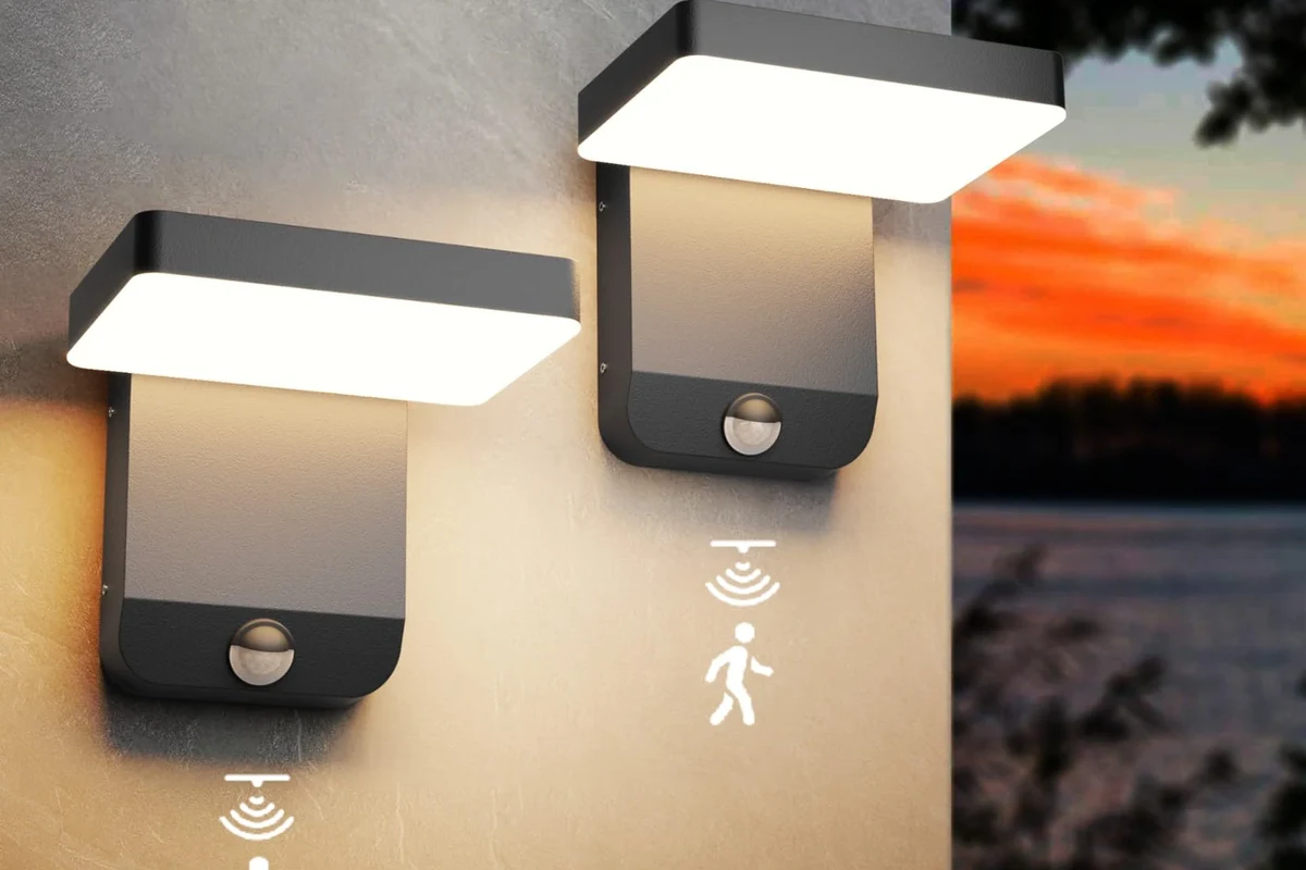 Motion sensor light illuminating a home entryway at night