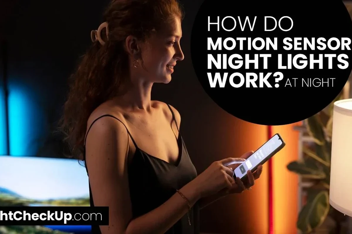 Motion sensor mounted in a dark hallway detecting movement for automatic lighting