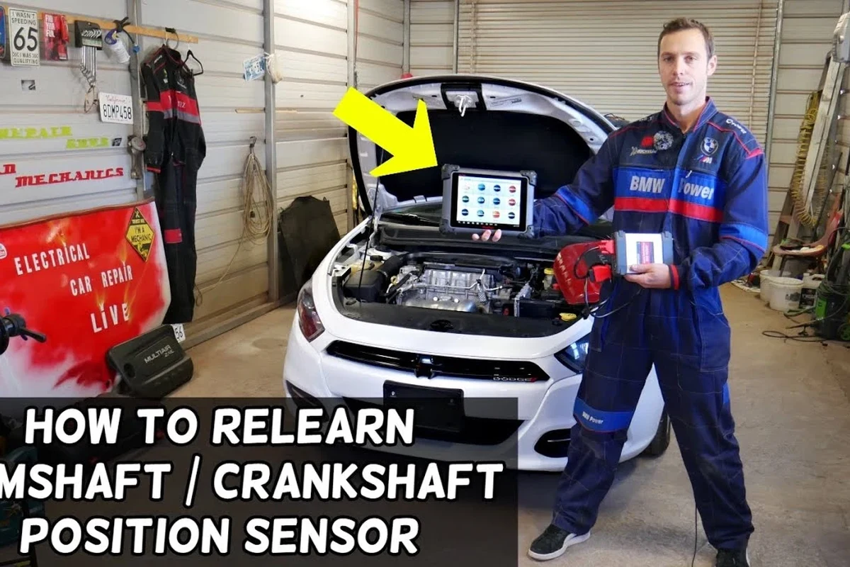 Mechanic-style view of an engine crankshaft position sensor near the engine block