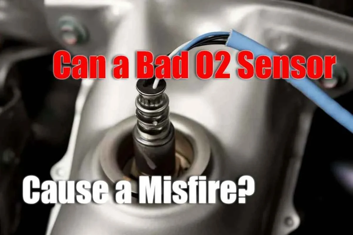 Mechanic diagnosing an O2 sensor and engine misfire with an OBD2 scanner in a car engine bay