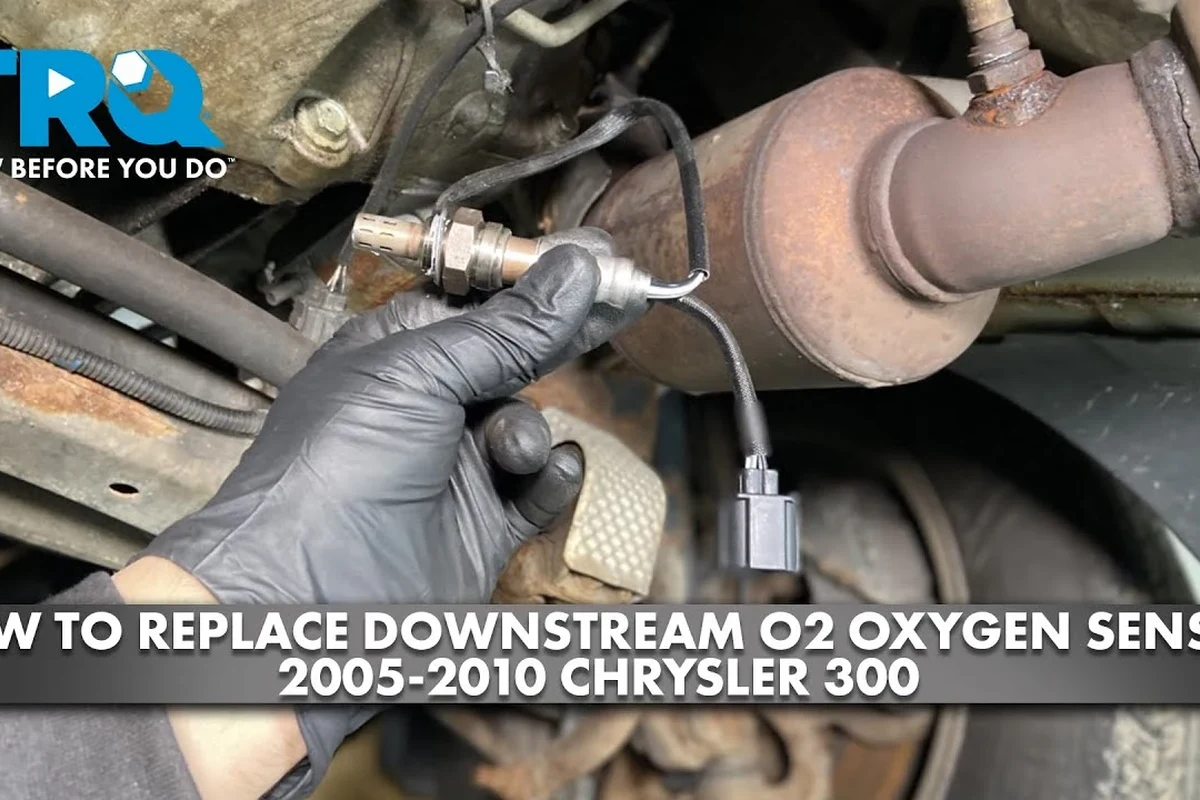Mechanic-style diagnostic view of O2 sensor and catalytic converter inspection on a car exhaust system