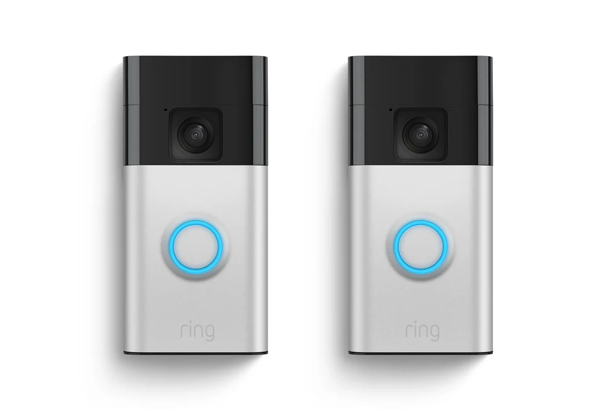 Wireless Ring Video Doorbell 2 mounted by a front door with smartphone app setup