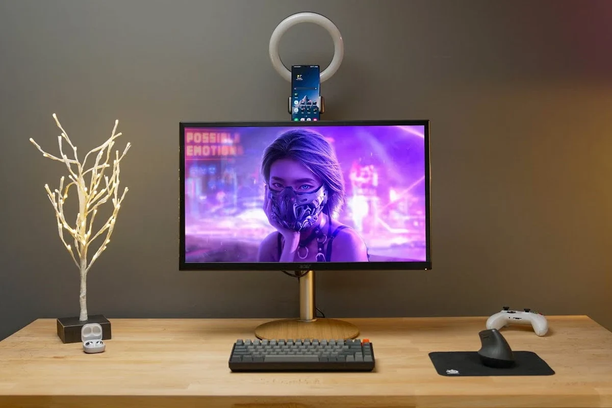 iPhone charging setup with USB-C cable, wall adapter, and wireless charger on a desk