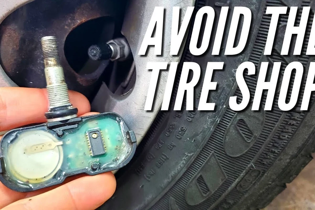 Dashboard tire pressure warning light illuminated on a modern vehicle instrument cluster