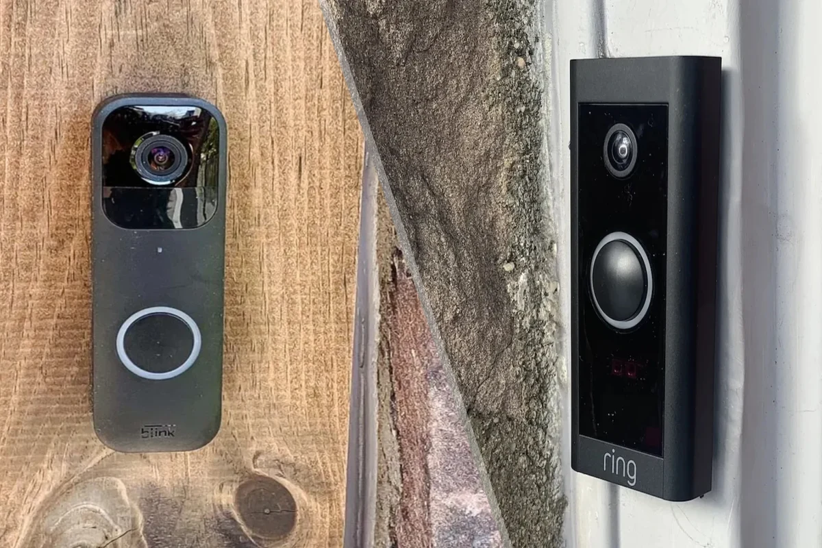 Modern video doorbell mounted beside a front door with a smartphone showing live camera alerts