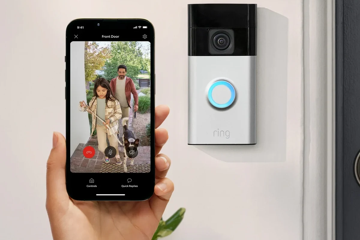 Ring video doorbell mounted at a front door with Wi-Fi and smartphone app setup