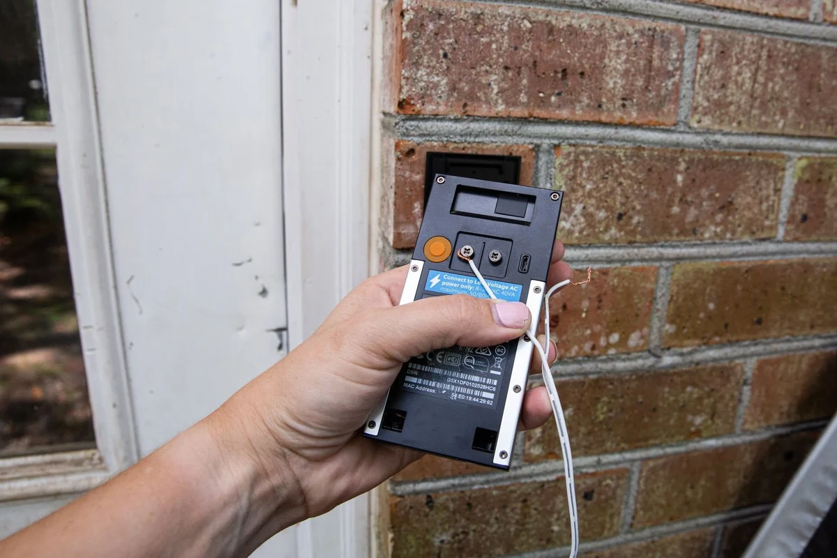 Ring video doorbell mounted at a home entrance without existing doorbell wiring