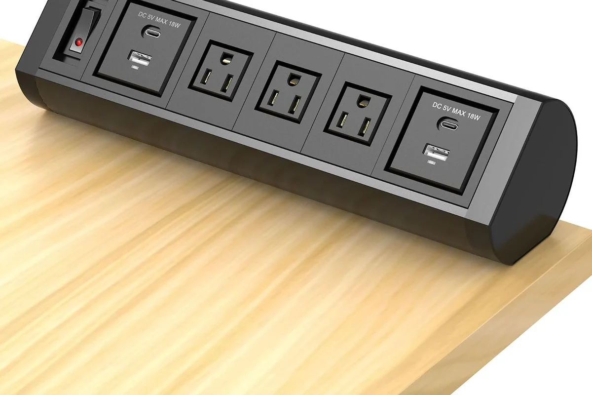 Braided and non-braided USB-C cables coiled side by side on a clean desk