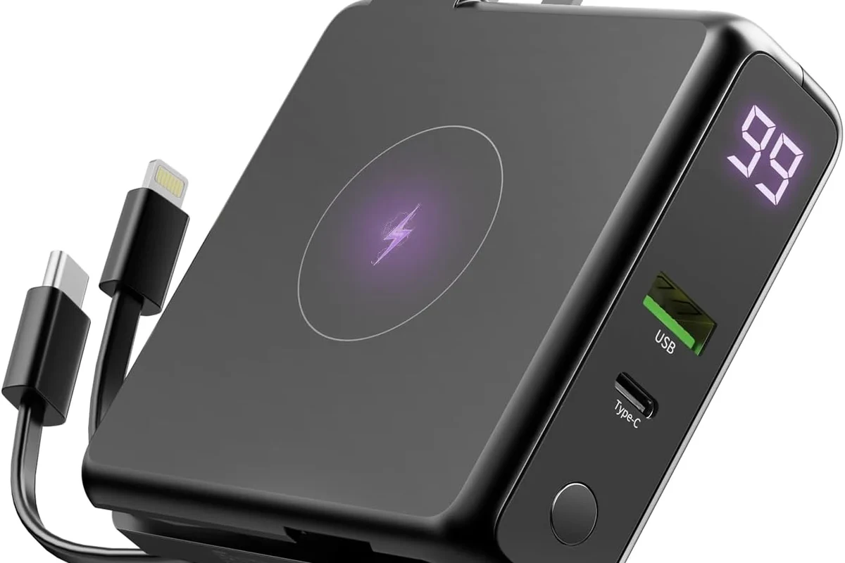 USB-C fast charging cable connected to a modern charger and smartphone on a desk