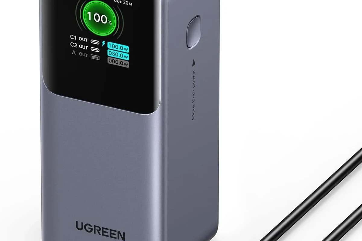 USB-C wattage checker inline with charging cable and device on a desk