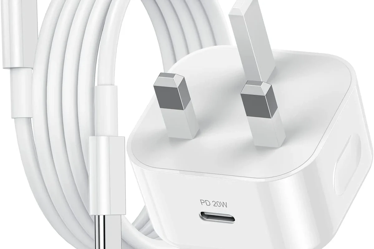Budget USB-C charging cables beside a phone, laptop, and charger on a clean desk
